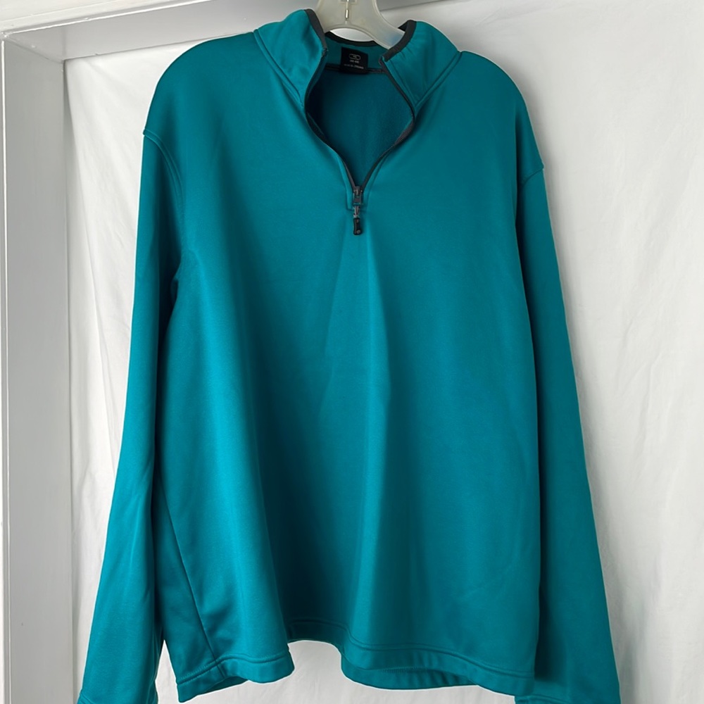 Excellent condition teal starter size extra large, long sleeve 100% polyester